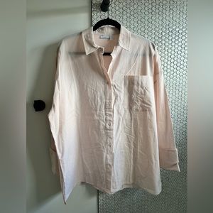 Oversized button down boyfriend shirt. Pink striped, perfect for spring!
